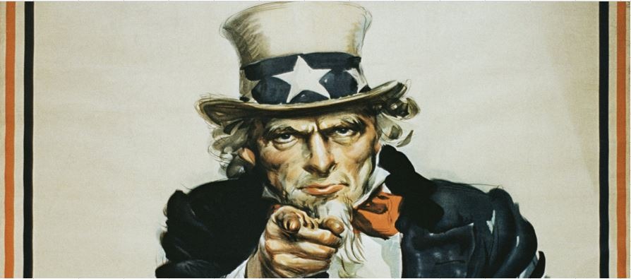 Uncle Sam points directly at the viewer, encouraging enlistment. His iconic top hat and suit emphasize patriotism, representing U.S. military recruitment.